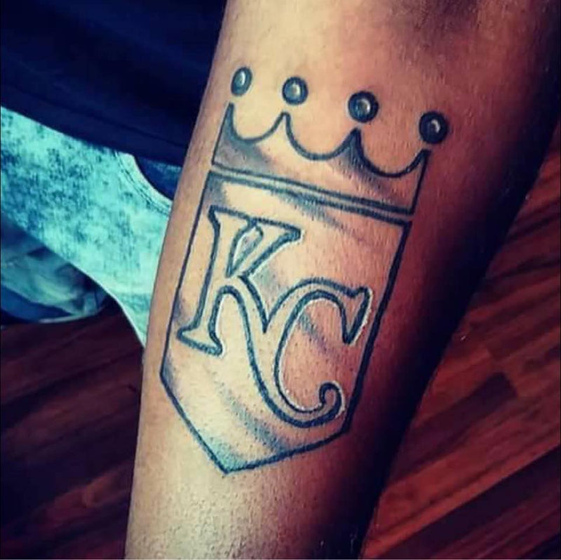 Kansas City Royals logo tattoo on forearm by Nick Young in Kansas City 